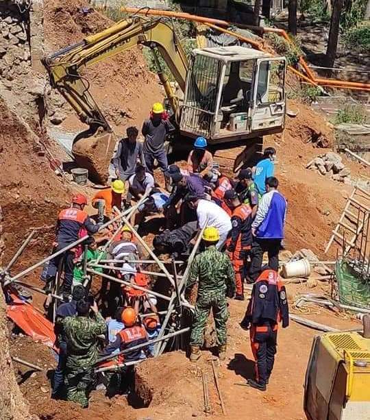 Two construction workers were rescued from a soil erosion